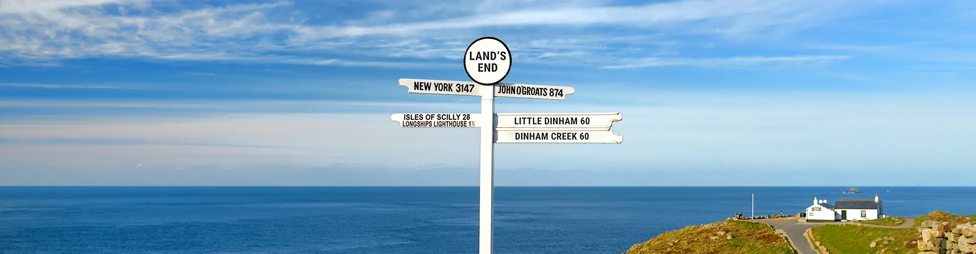 Lands signpost with directions to little dinham