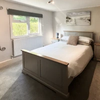 lodge double bedroom with double bed